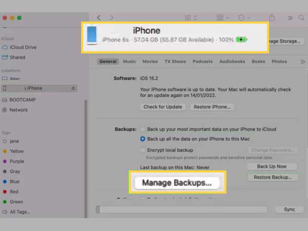 Find your iPhone under ‘Locations’ click on it and choose ‘Manage Backups.’